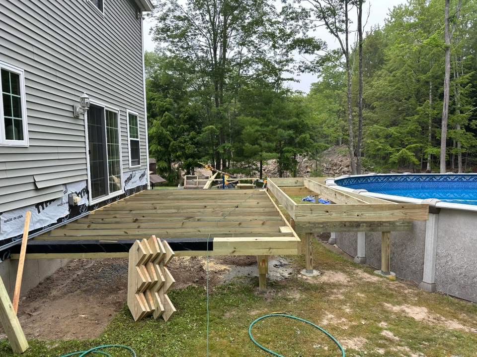 Deck framing and stair layout under construction