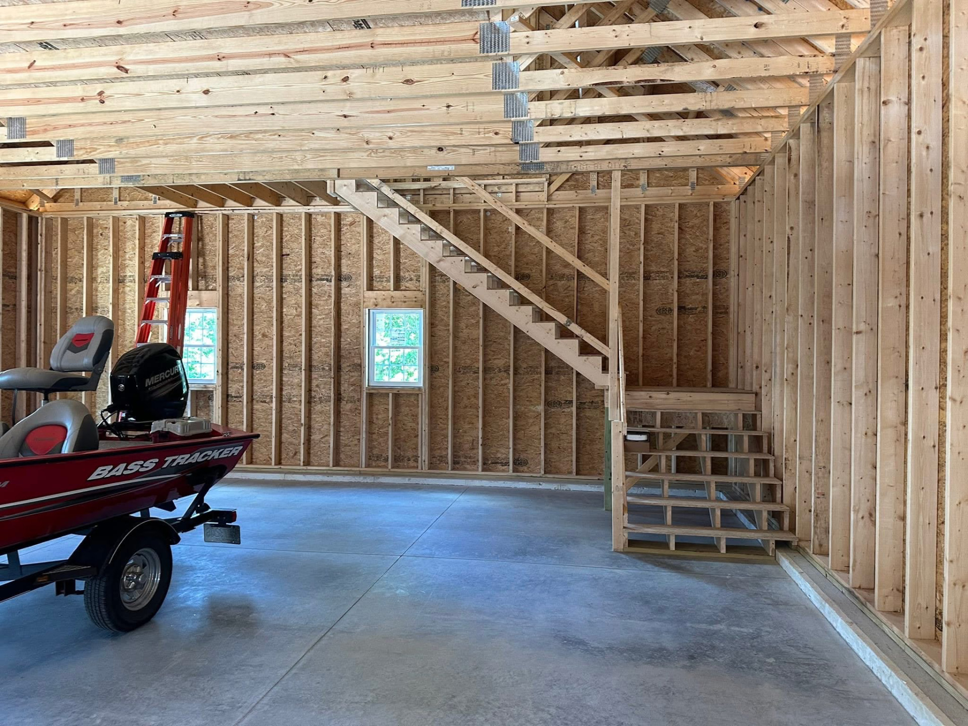 Garage interior framing with staircase to upstairs storage space
